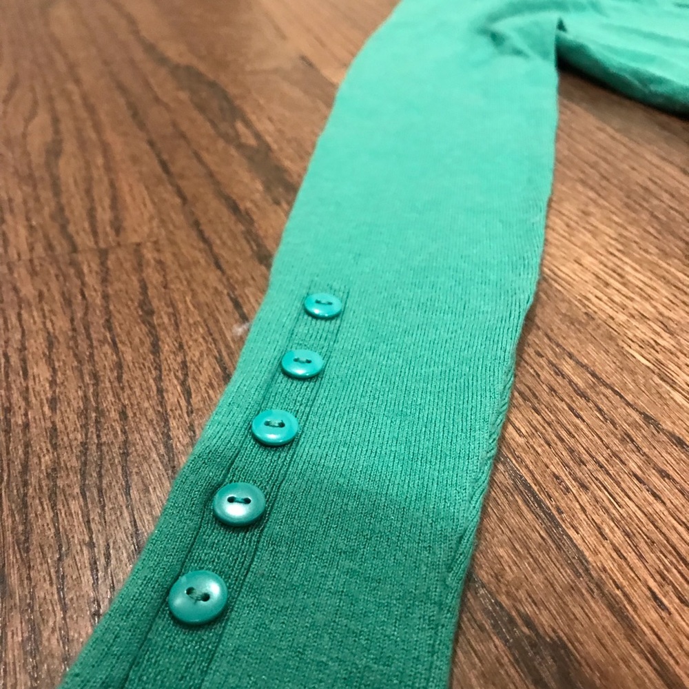 Beautiful turquoise cardigan.